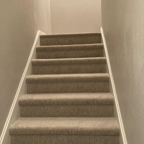 Beige carpeted stairs in Sun Prairie, WI